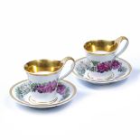 Pair of KPM Berlin cabinet cups and saucers circa 1820, in the Biedermeier taste, finely painted