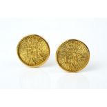 OF ROYAL INTEREST: A PAIR OF 9CT GOLD CUFFLINKS BY GERALD BENNEY, each circular panel with Elizabeth