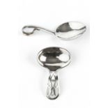 A SILVER ARTS & CRAFTS STYLE CADDY SPOON, the handle pierced with a stylised harebell by Robert