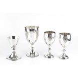 A LATE VICTORIAN SILVER GOBLET, engraved with sprays of flowers and ferns, by Walker & Hall,