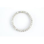 A DIAMOND CIRCLET PENDANT, designed as an openwork hoop of round brilliant-cut diamonds, white