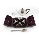 A LATE VICTORIAN SILVER TEAPOT, of half lobed form, with ebonised handle and knop, by William Hutton