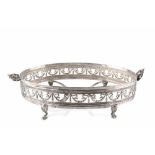A PORTUGUESE SILVER PLATED TOPAZIO OVAL SERVING DISH STAND, pierce decorated with a frieze ribbon