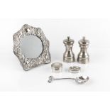 A COLLECTION OF SILVER TO INCLUDE: a pair of pepper grinders, a bottle coaster with turned wooden
