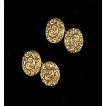 A COLLECTION OF CUFFLINKS AND DRESS STUDS, comprising a pair of oval panel cufflinks, profusely