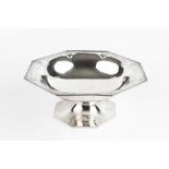 A SILVER PEDESTAL FRUIT STAND, of octagonal form with pierce decorated angles, on octagonal foot