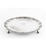 A GEORGE III SILVER SALVER, with gadrooned and scallop cast border, on claw and ball feet, by John