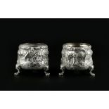 A PAIR OF EARLY VICTORIAN SILVER LARGE SALT OR CONDIMENT POTS, each cast in relief with a continuous