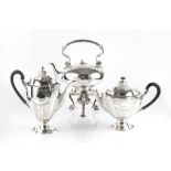A MID VICTORIAN SILVER PLATED TEA KETTLE ON STAND, of compressed circular form, with foliate