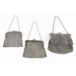 THREE SILVER MESH EVENING PURSES, with chain link handles, all stamped 925, largest 17cm wide (3)