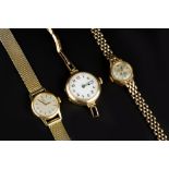 A LADY'S 9CT GOLD BRACELET WATCH BY ROTARY, the circular signed dial with baton markers, to a