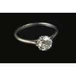 A DIAMOND SINGLE STONE RING, the round brilliant-cut diamond in eight claw setting, white precious