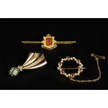 THREE BROOCHES, comprising an enamel regimental bar brooch, a half pearl and gem set wreath