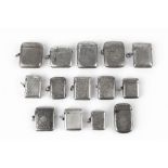 A COLLECTION OF FOURTEEN SILVER VESTA CASES, mainly late Victorian/Edwardian, some with engraved