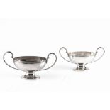 A PAIR OF GEORGE III SILVER TWIN HANDLED SAUCE TUREENS, of pedestal oval design, by Thomas Ellis,