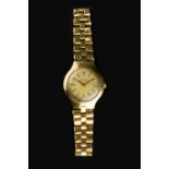 A LADY'S 18CT GOLD 'ACCUTRON' BRACELET WATCH BY BULOVA, the circular gilt dial with baton markers,