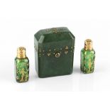 A PAIR OF 19TH CENTURY FRENCH MINIATURE GREEN GLASS SCENT FLASKS, with chinoiserie gilt
