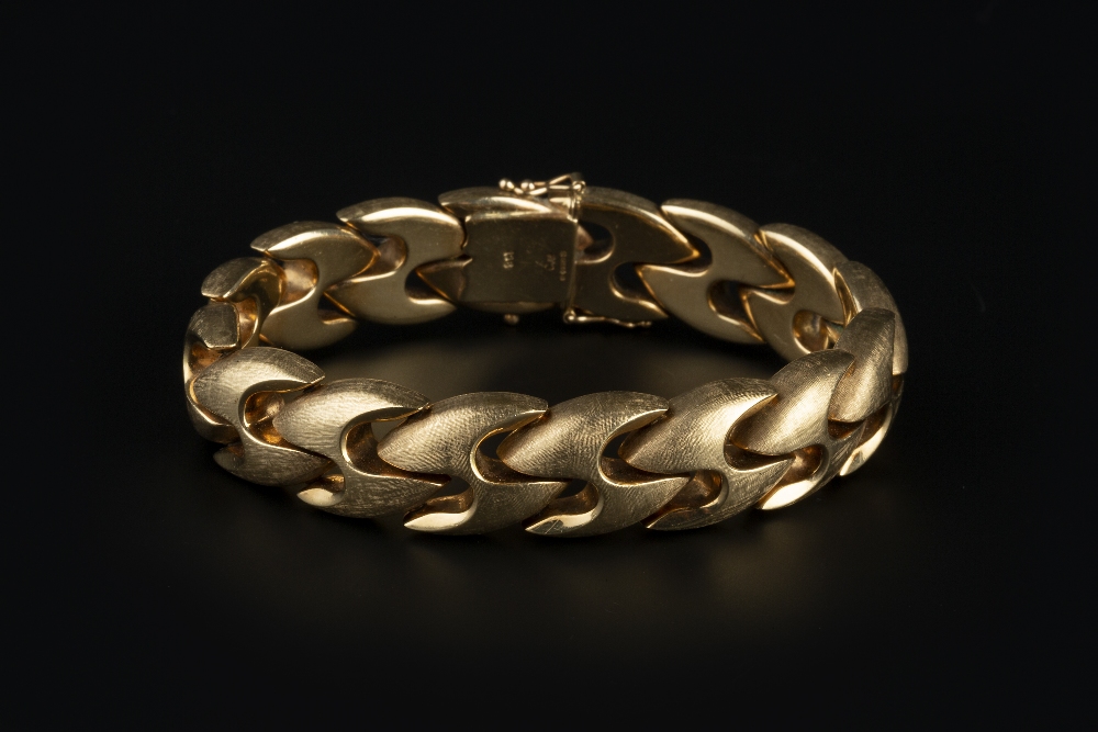 A 9CT GOLD FANCY-LINK BRACELET, of brushed finish, maker's mark 'CJ LD', with London import marks,