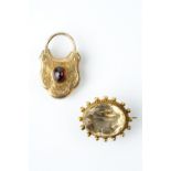 A COLLECTION OF ANTIQUE AND LATER JEWELLERY, comprising a Victorian garnet set padlock clasp, with
