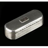 A GEORGE IV SILVER RECTANGULAR SNUFF BOX, with rounded ends, having reeded and engine turned