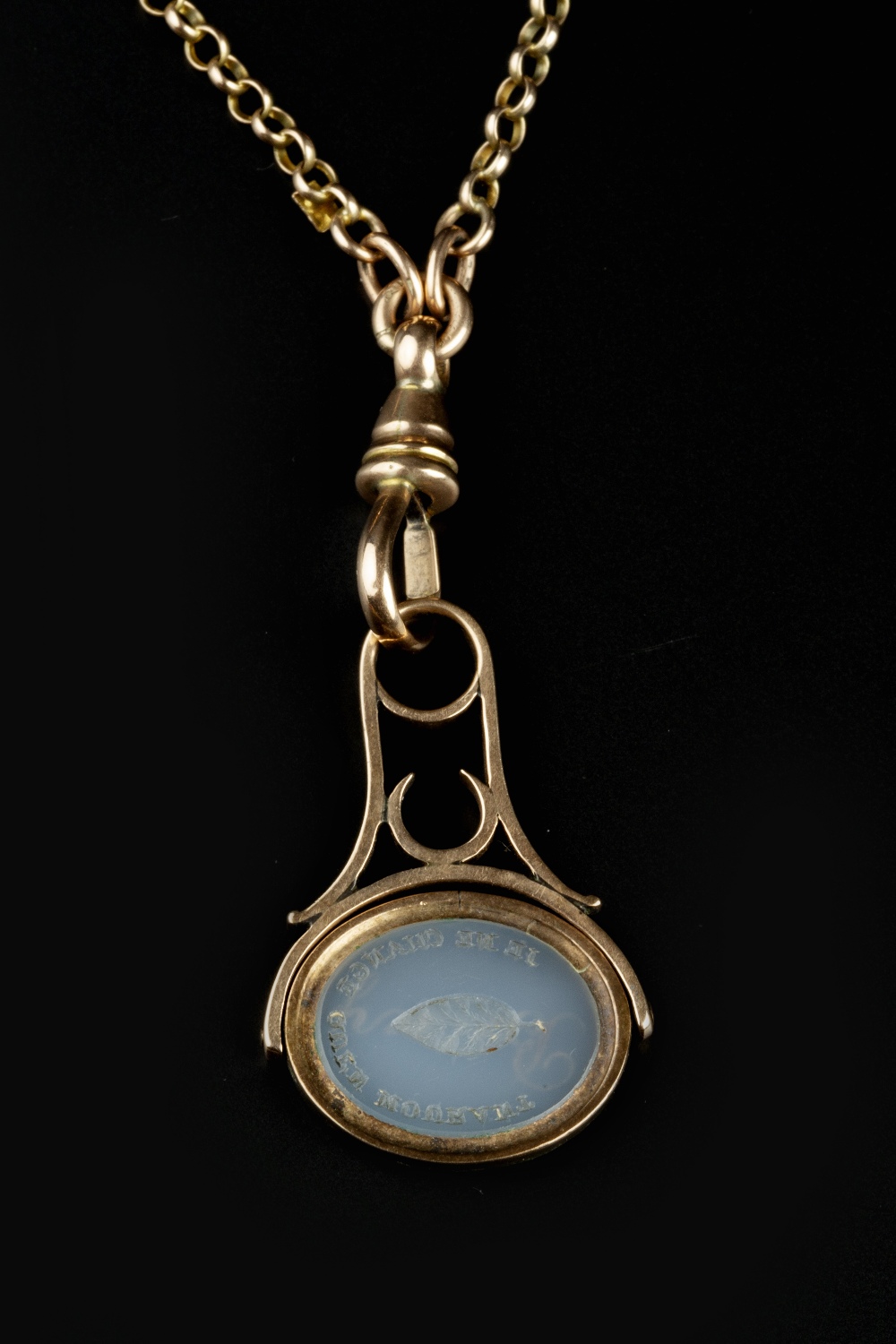 A CHALCEDONY SWIVEL FOB SEAL PENDANT, with dual-sided inscription, suspended from a belcher-link