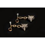 A PAIR OF EDWARDIAN NOVELTY CUFFLINKS, each modelled as a fox's mask and bugle, with chain-link
