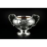 A GEORGE IV SILVER TWIN HANDLED SUGAR BOWL, by Paul Storr, the shaped body embossed and engraved
