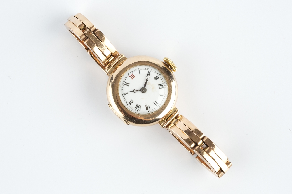 A LADY'S 9CT GOLD BRACELET WATCH, the circular white dial with black and red Roman numerals and - Image 2 of 2