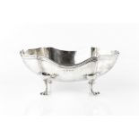A SILVER BOWL of shaped oval form, on cabriole legs with paw feet, by Arthur & John Zimmerman,
