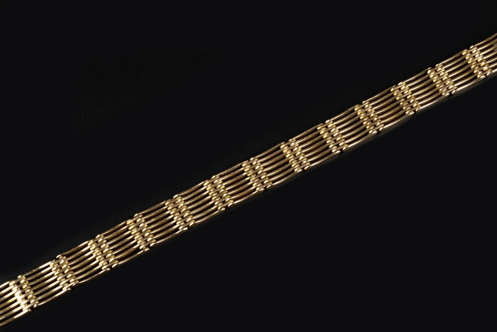 A GATE-LINK BRACELET, stamped '15', length 19cm