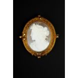 A VICTORIAN OVAL SHELL CAMEO BROOCH/PENDANT, carved to depict the profile of Demeter, the Greek
