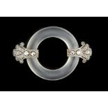 A ROCK CRYSTAL AND DIAMOND BROOCH, circa 1920-25, the rock crystal circlet accented by foliate