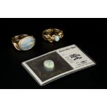 AN OPAL SINGLE STONE RING, the oval cabochon opal in collet setting, to a fancy 18ct gold mount,