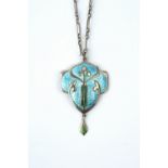 AN ARTS AND CRAFTS ENAMEL PENDANT, the foliate cartouche-shaped panel heightened with blue and green