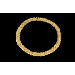 AN 18CT GOLD FANCY-LINK COLLAR NECKLACE BY TIFFANY & CO, of plaited ropetwist design, signed Tiffany
