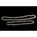 A CULTURED PEARL NECKLACE WITH DIAMOND SET CLASP, the single strand of graduated cultured pearls