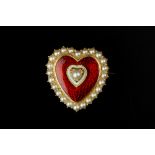 A HALF PEARL AND ENAMEL BROOCH, the heart-shaped panel centred with a half pearl to a white and