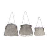 THREE SILVER MESH EVENING PURSES, with chain link handles, all stamped 925, largest 18.5cm wide (3)