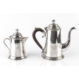 AN INDIAN SMALL COFFEE POT, and matching hot milk pot, the coffee pot with horn handle,