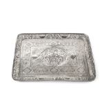 AN INDIAN WHITE METAL RECTANGULAR TRAY, embossed to the centre with two figures on horseback, and