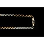 A FANCY-LINK CHAIN WITH GEM SET CLASP, the two colour precious metal curb-link chain with box-shaped