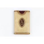 A GEORGIAN IVORY AND GILT METAL MOUNTED NEEDLE CASE, with oval monogram reserve and burgundy insert,