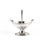 A GEORGE III SILVER SWING HANDLED SUGAR BASKET, of boat shaped form, with reeded borders and