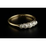 A DIAMOND FIVE STONE RING, the graduated old-cut diamonds in claw setting, two colour precious metal