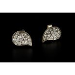 A PAIR OF DIAMOND EAR STUDS, each designed as a teardrop-shaped panel of graduated round brilliant-