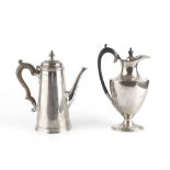 A SILVER COFFEE POT, of plain tapered design, with domed cover and composite handle, London 1966,