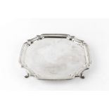 A SILVER SALVER, of shaped squared outline on pad feet, by J.B. Chatterley & Sons Ltd, Birmingham
