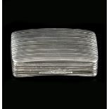 A GEORGE III SILVER RECTANGULAR SNUFF BOX, of slightly curved, reeded form, by John Shaw, Birmingham