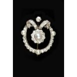 A PEARL AND DIAMOND PANEL BROOCH, the openwork cartouche-shaped panel centred with a detachable