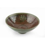 David Frith (b.1943) Bowl celadon and tenmoku glazes impressed potter's seal 30.5cm diameter.